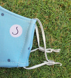 mascarilla higiénica reutilizable homologada, lunares verde mint, singular.