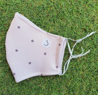 Approved reusable hygienic mask, beige polka dots, single.