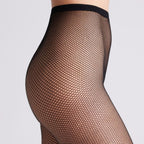 Basic and super comfortable fishnet tights by Ysabel Mora.