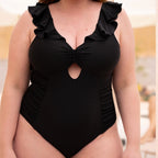 Swimsuit with ruffles, figure-shaping, Singular Swim.