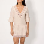 Short-sleeved linen dress, Ysabel Mora coves.