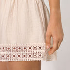 Short-sleeved linen dress, Ysabel Mora coves.