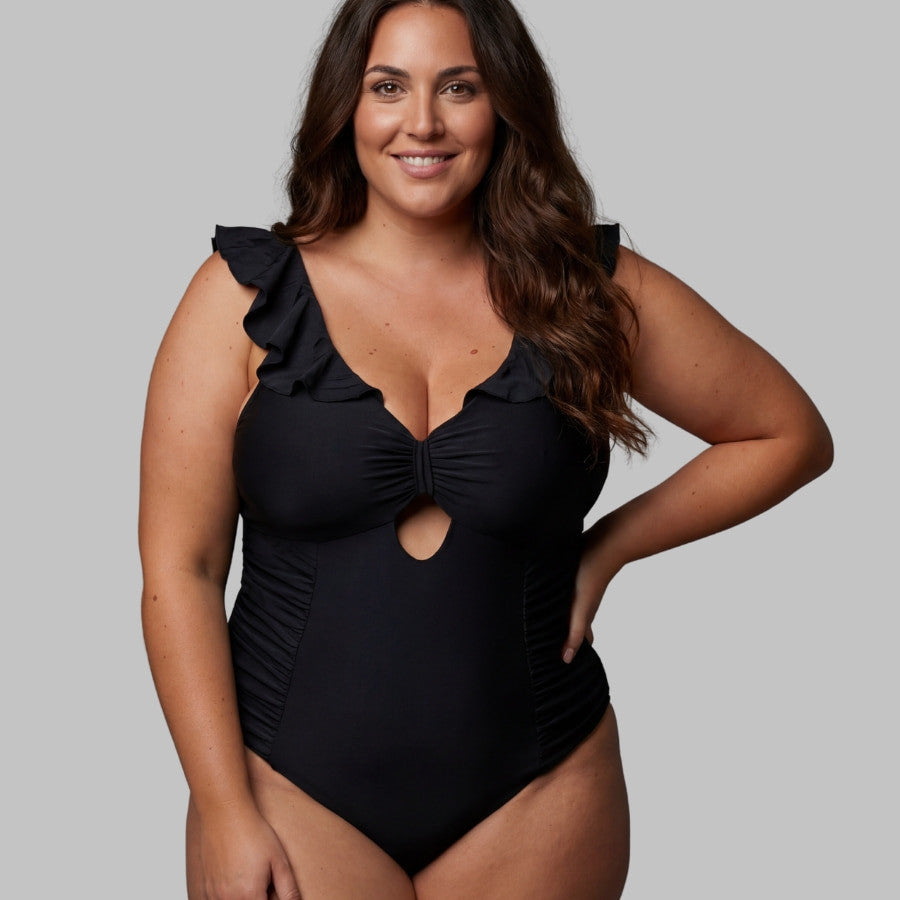 Swimsuit with ruffles, figure-shaping, Singular Swim.