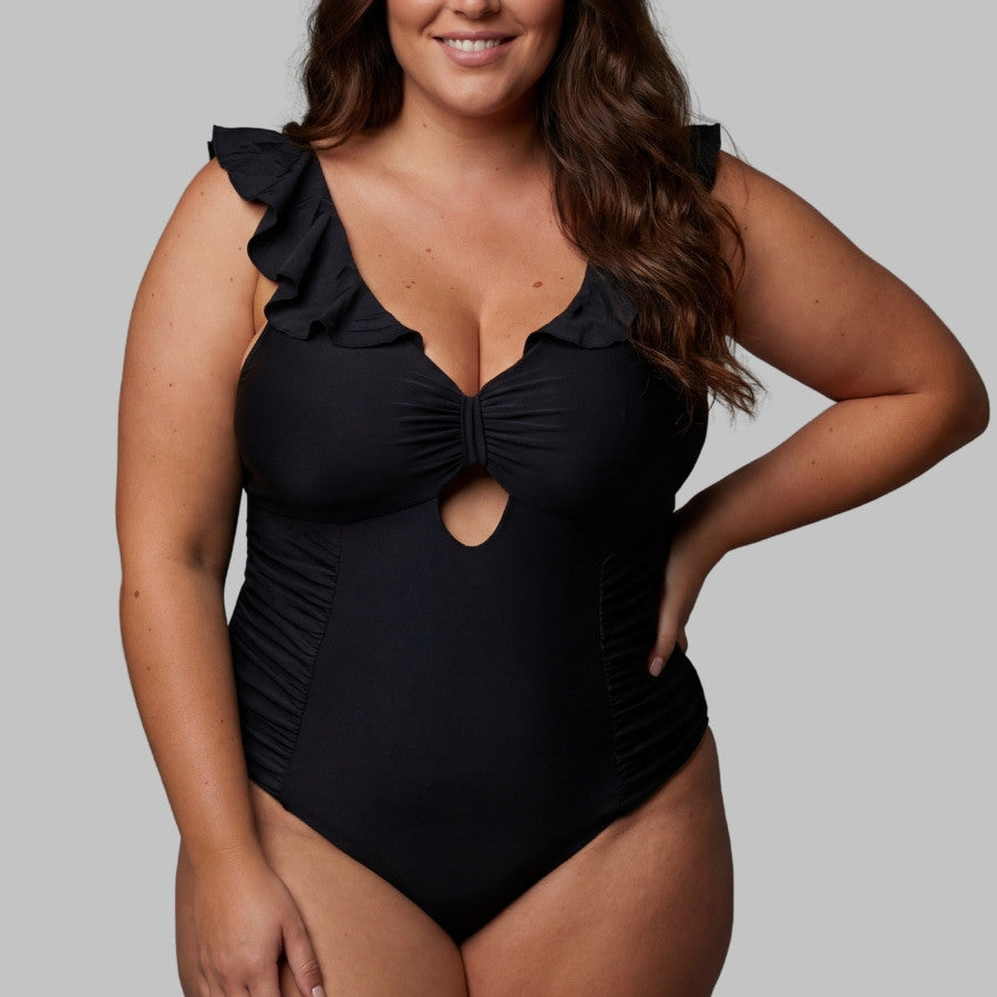 Swimsuit with ruffles, figure-shaping, Singular Swim.