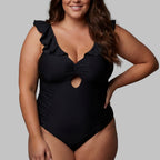 Swimsuit with ruffles, figure-shaping, Singular Swim.