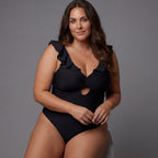 Swimsuit with ruffles, figure-shaping, Singular Swim.