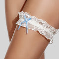 Liga para novia de encaje floral y lacito azul de selene.